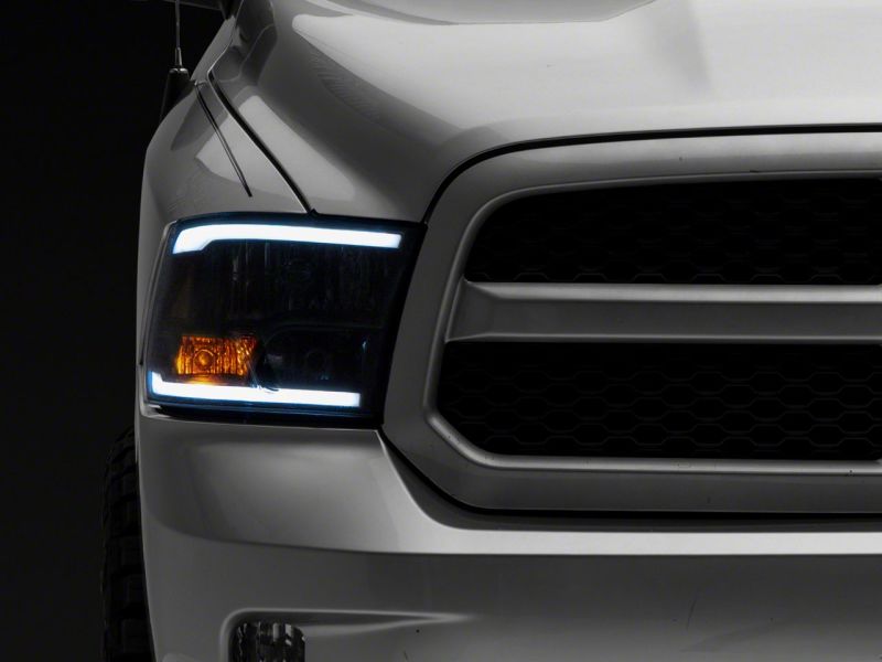 Raxiom - Raxiom 09 - 18 Dodge RAM 1500/2500/3500 Axial Series Headlights w/ LED Bar - Blk Housing (Clear Lens) - Demon Performance