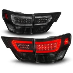ANZO - ANZO 11-13 Jeep Grand Cherokee LED Taillights w/ Lightbar Black Housing/Smoke Lens 4pcs - Demon Performance