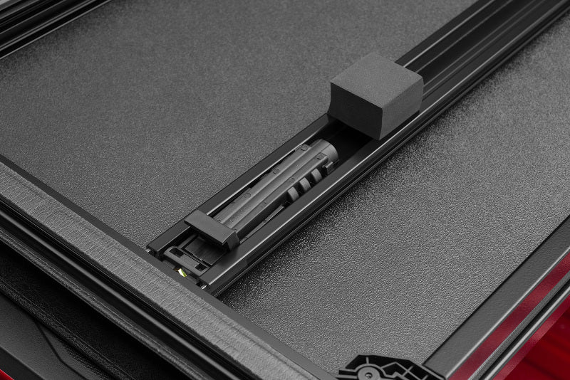 LUND - Lund 04 - 15 Nissan Titan (5.5ft. Bed) Hard Fold Tonneau Cover w/Bracket Kit - Black - Demon Performance
