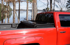 LUND - Lund 04 - 15 Nissan Titan (5.5ft. Bed) Hard Fold Tonneau Cover w/Bracket Kit - Black - Demon Performance