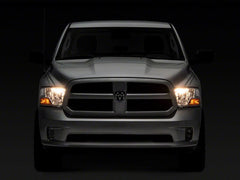 Raxiom - Raxiom 09 - 18 Dodge RAM 1500 Axial OEM Rep Headlights w/ Single Bulb - Chrome Housing (Clear Lens) - Demon Performance