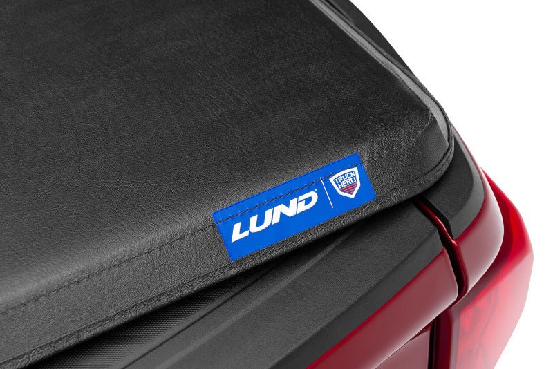 LUND - Lund 04 - 15 Nissan Titan (5.5ft. Bed) Hard Fold Tonneau Cover w/Bracket Kit - Black - Demon Performance