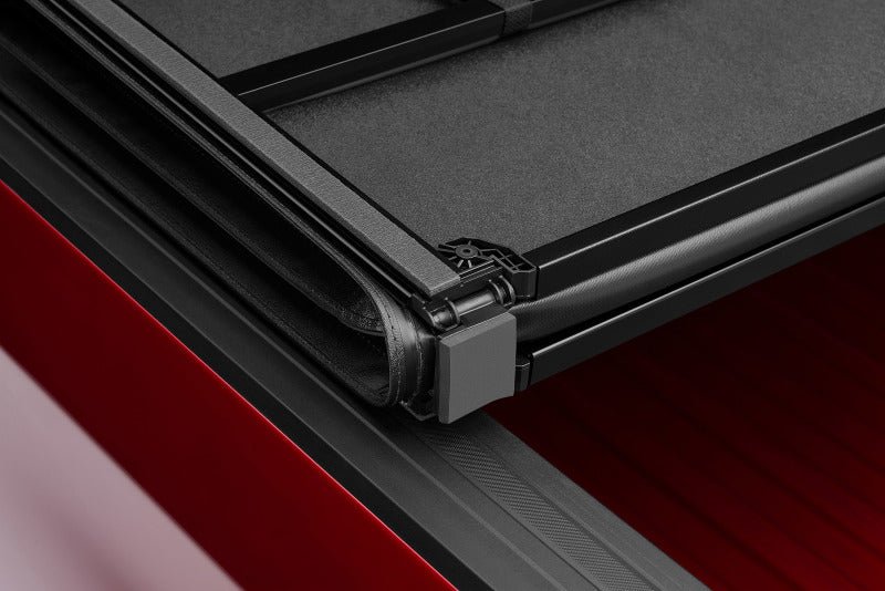 LUND - Lund 04 - 15 Nissan Titan (5.5ft. Bed) Hard Fold Tonneau Cover w/Bracket Kit - Black - Demon Performance